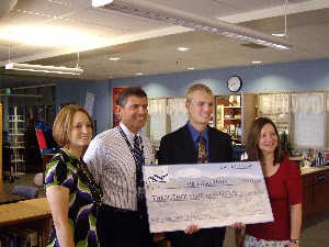 In August, Hahn (2nd from r) celebrates his science fair win with his teaching staff from The Classical Academy: Candus Muir (l), Dr. Peter DeGraaf (2nd from l) and Linda Cummings.